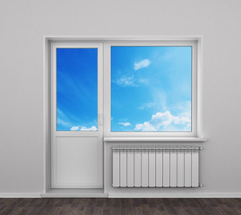 Fototapeta premium radiators beside a door with a window in the room, the view from the window. 3d illustrator