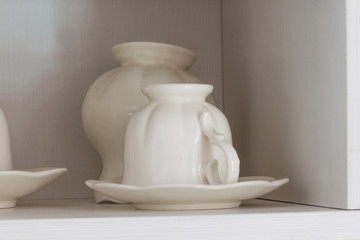coffee cup on shelf