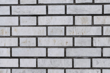 Grey brick wall for background and texture.