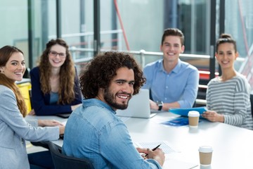 Fototapeta premium Portrait of smiling business team in meeting