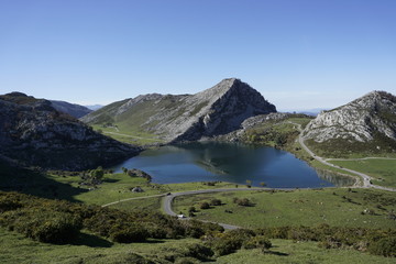 Naklejka na ściany i meble Covadonga lake, a green landscape in Northern Spain