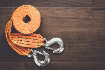 orange towing rope on the wooden table