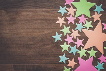 plastic toy stars on the wooden table