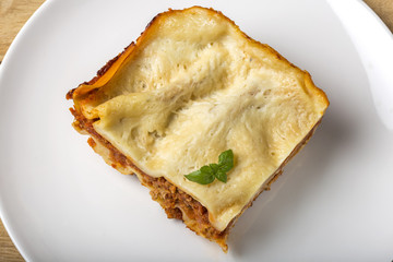 Homemade Italian lasagna bolognese on plate