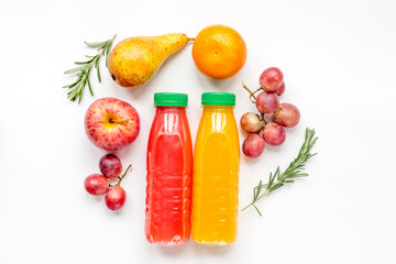 bottles of smoothie with fruits on white table top view mock up
