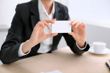 Business woman giving visit card