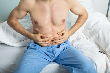 Man Suffering From Stomach Ache