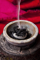 Styrax is a natural resin obtained from the Liquidambar bark. In ancient times this was the most important incense material. The scent of the black Styrax is strong and has an intensive vanilla aroma.