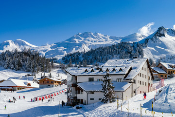 Beautiful winter weather on ski resort in high mountains