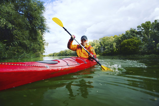 A trip by the river on a kayak.
