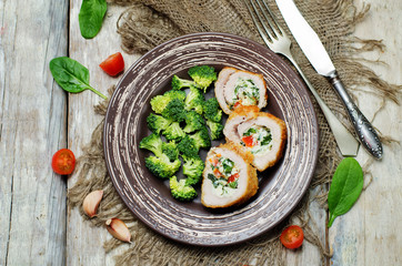 Ricotta tomato spinach stuffed turkey with broccoli