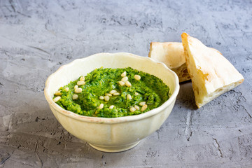 Spinach hummus with pita.