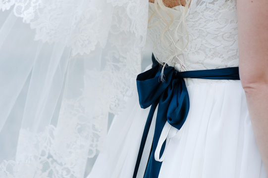 Big, Dark Blue Bow, On Bride Corsage