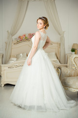 Fototapeta premium Beautiful bride before wedding ceremony in appartament