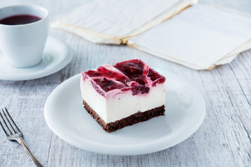 Delicious and sweet cheesecake with cherry jelly