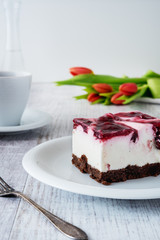Delicious and sweet cheesecake with cherry jelly