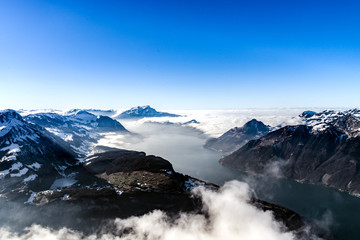 Fototapeta premium Panoramic aerial view to Luzern lake from high peak