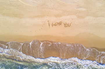 I love you written on the beach
