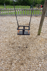 Park swing with wood chip safety surface © JohnatAPW