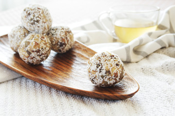 Fototapeta na wymiar homemade healthy raw energy sweet balls - indian vegetarian desserts.