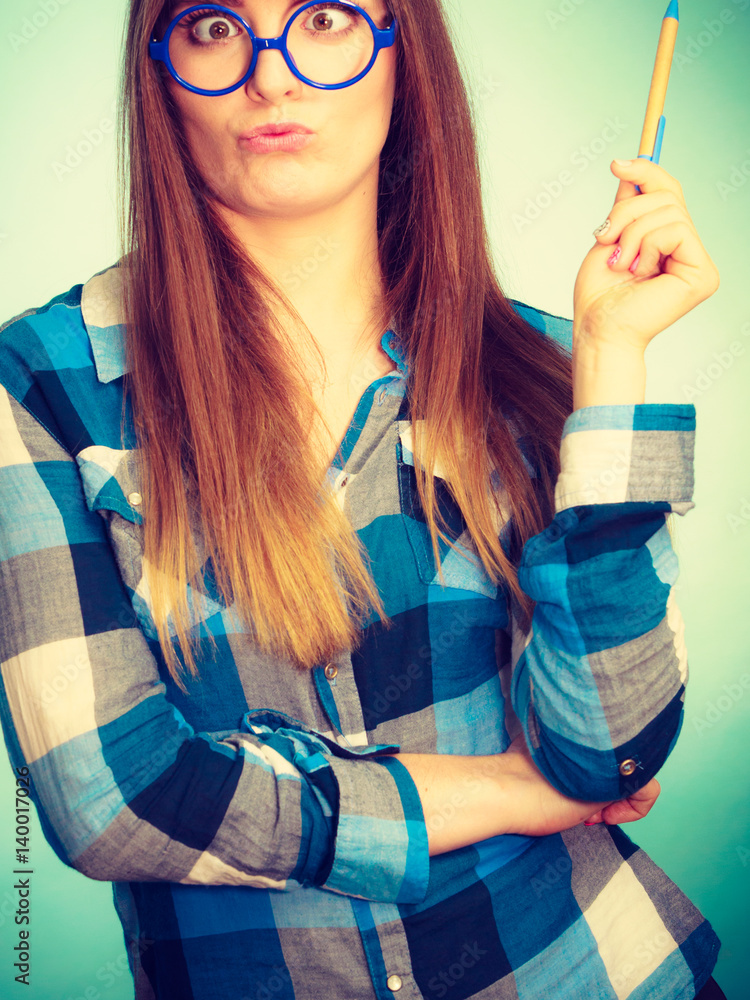 Poster Weird nerdy woman in glasses holding pen