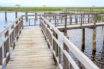 walkway or walkpath with old pavilion in lake of Khao Samroiyod National Park, Prachuap Khiri Khan, Thailand.