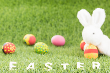 Bunny toys and Easter eggs with text