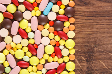 Colorful medical pills and capsules, health care concept