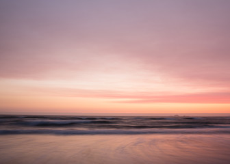 Smooth pastel colors of sunset over the ocean