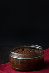Chocolate Souffle on a Red Napkin and Dark Background from the Front Vertical