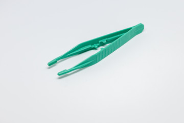 Green pliers for first aid on white background, Isolate Pliers 