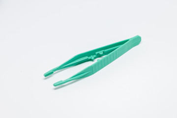 Green pliers for first aid on white background, Isolate Pliers 
