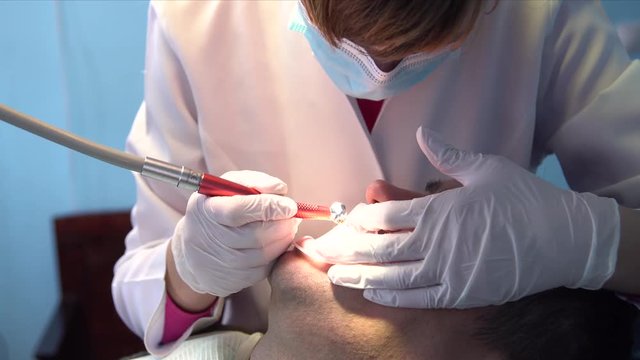 A young man came to the dentist for dental treatment