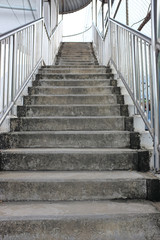 Fototapeta na wymiar Overpass stairs in the city