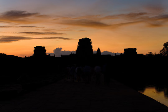 Angkor Wat Temple Entrance at Morning Sunrise with Tourists in Cambodia