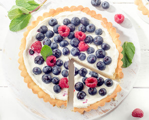 Sweet Cheese cakes with fresh berries.