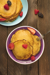 Freshly baked homemade pancakes with fresh fruit