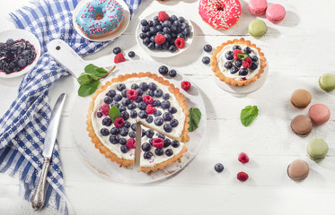 Sweet dessert with blueberries and raspberries.