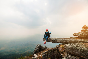 Fototapeta premium happy woman smile on top mountain with blue sky at sunny day, subject is soft focus