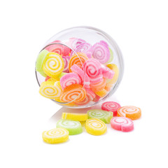 Jelly sweet flavor fruit candy dessert colorful in glass jars on white background.
