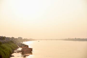 Fototapeta na wymiar Breathtaking Sunset over the Mekong River in Nong Khai, Thailand