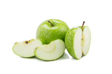 Fresh green apples and sliced green apple isolated on white background.