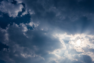 white fluffy clouds in the blue sky.