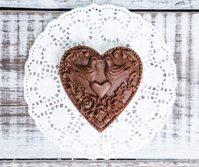 gentle romantic valentine chocolate figures on cookie stand