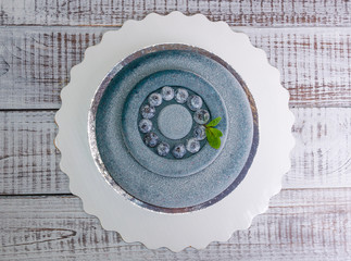 blue chocolate velour mousse cake with blueberries