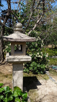 A toro - traditional Japanese stone lantern in a garden 