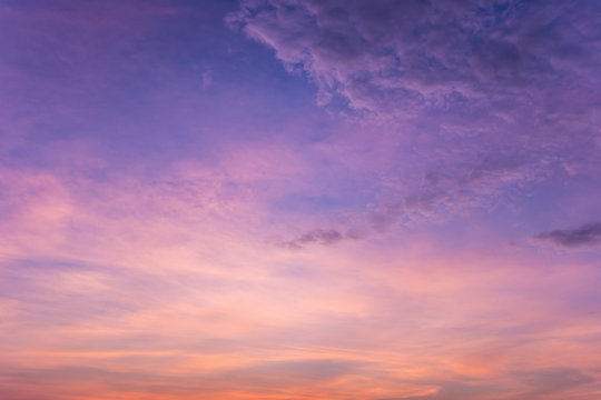 Fototapeta Colorful dramatic sky with cloud at sunset.Sky with sun background.