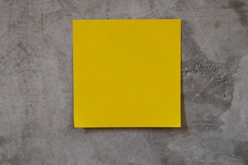 post it note with cement wall