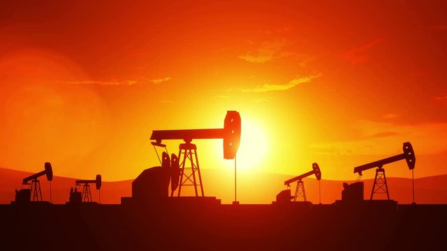 4k 3d rendered seamless looped oil pump jacks on sunset sky background.