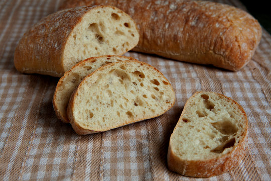 Fresh sliced italian Ciabatta bread on background
